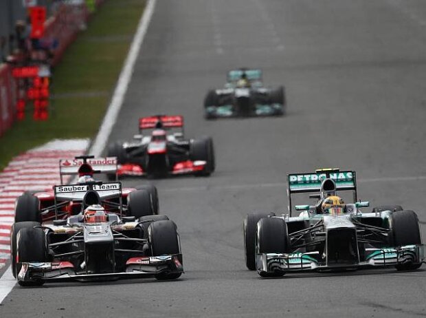 Nico Hülkenberg, Lewis Hamilton Nico Hülkenberg, Lewis Hamilton