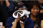 Ein japanischer Fan fiebert dem Besuch des Weltmeisters entgegen