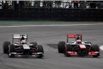 Nico Hülkenberg (Sauber) und Jenson Button (McLaren) 