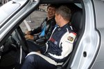 Bernd Mayländer und Redakteur Sven Haidinger im Safety-Car, einem Mercedes-Benz SLS AMG