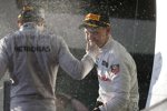 Kevin Magnussen (McLaren) und Nico Rosberg (Mercedes) 