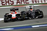 Jules Bianchi (Marussia) und Adrian Sutil (Sauber) 