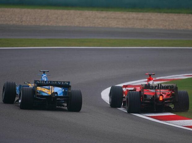 Michael Schumacher, Giancarlo Fisichella Michael Schumacher, Giancarlo Fisichella