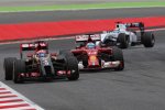 Romain Grosjean (Lotus) und Fernando Alonso (Ferrari) 