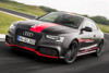 Bild zum Inhalt: Audi RS5 TDI beim Sprung nach vorn