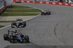 Kevin Magnussen (McLaren), Adrian Sutil (Sauber) und Romain Grosjean (Lotus) 