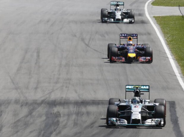 Nico Rosberg, Sebastian Vettel, Lewis Hamilton Nico Rosberg, Sebastian Vettel, Lewis Hamilton