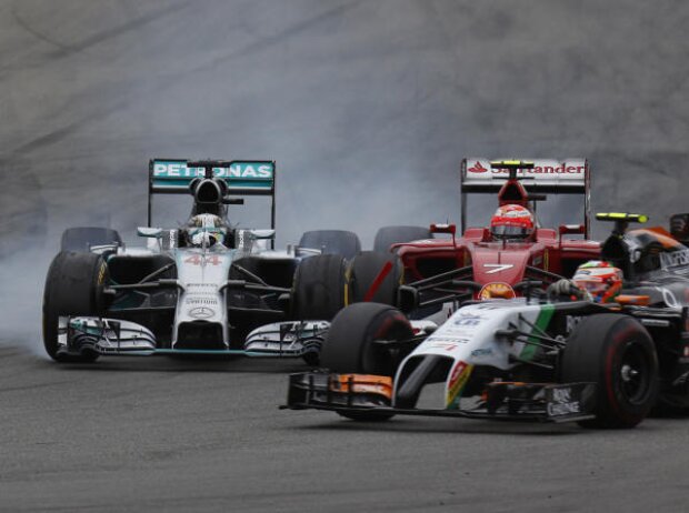 Titel-Bild zur News: Kimi Räikkönen, Lewis Hamilton