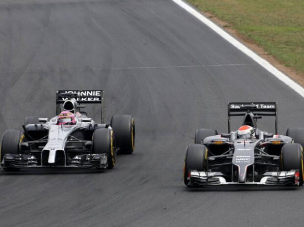 Jenson Button, Adrian Sutil Jenson Button, Adrian Sutil