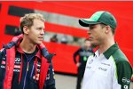 Sebastian Vettel (Red Bull) und Andre Lotterer 