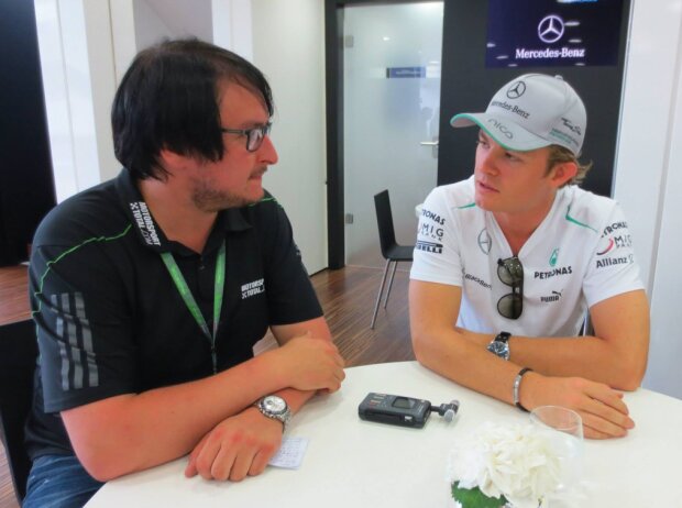 Chefredakteur Christian Nimmervoll und Nico Rosberg