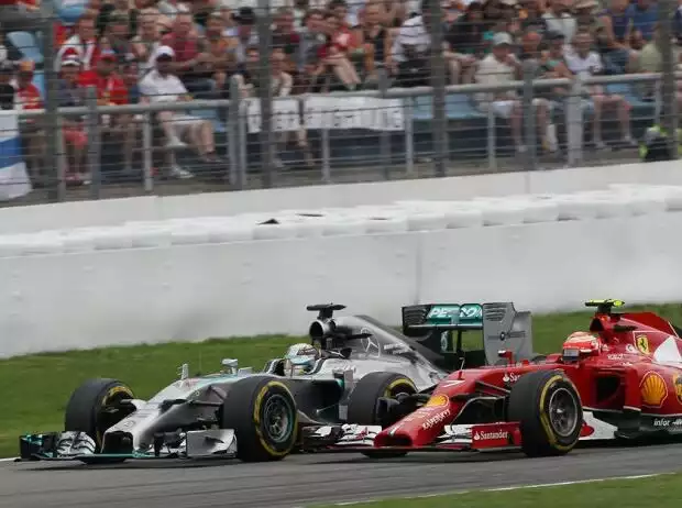 Lewis Hamilton, Kimi Räikkönen Titel-Bild zur News: Lewis Hamilton, Kimi Räikkönen