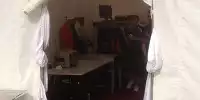Sicherheitskontrolle mit Röntgenscanner am Rennstrecken-Eingang in Bahrain