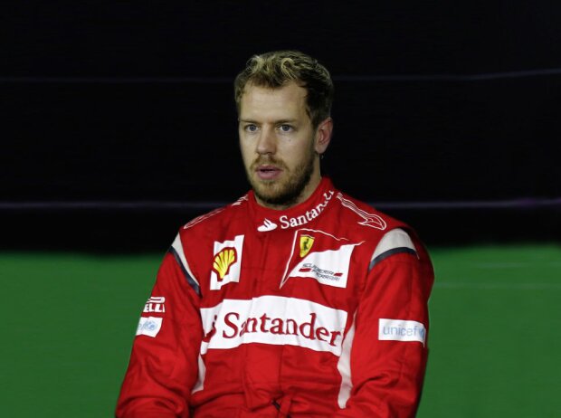 Sebastian Vettel im Ferrari-Overall (Fotomontage)