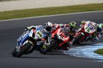 Randy de Puniet vor Troy Bayliss 