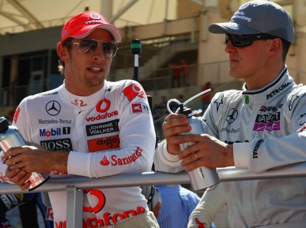Michael Schumacher, Jenson Button Michael Schumacher, Jenson Button