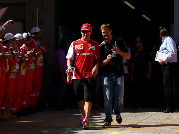 Titel-Bild zur News: Sebastian Vettel, Kimi Räikkönen