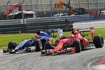 Felipe Nasr (Sauber) und Sebastian Vettel (Ferrari) 