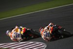 Marc Marquez hinter Daniel Pedrosa (Honda)