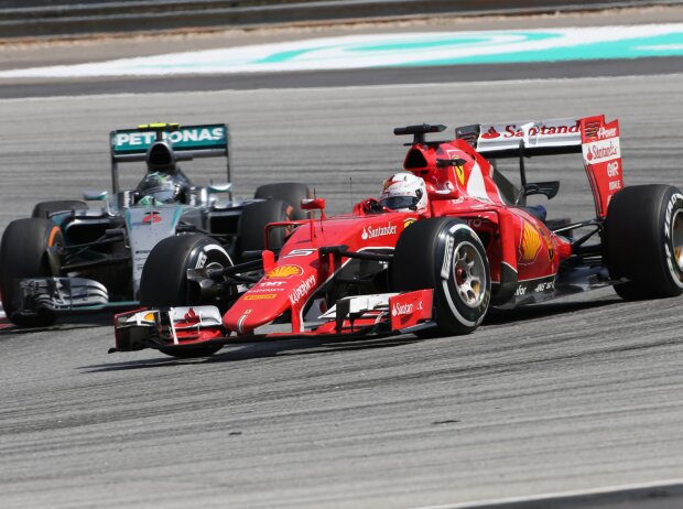 Sebastian Vettel, Nico Rosberg Sebastian Vettel, Nico Rosberg