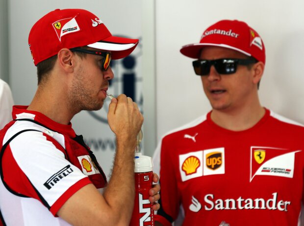 Sebastian Vettel, Kimi Räikkönen Sebastian Vettel, Kimi Räikkönen