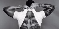 Bild zum Inhalt: Körperkunst: Weltmeister Hamilton erklärt seine Tattoos