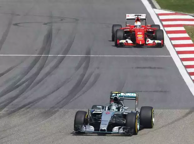 Nico Rosberg, Sebastian Vettel Titel-Bild zur News: Nico Rosberg, Sebastian Vettel