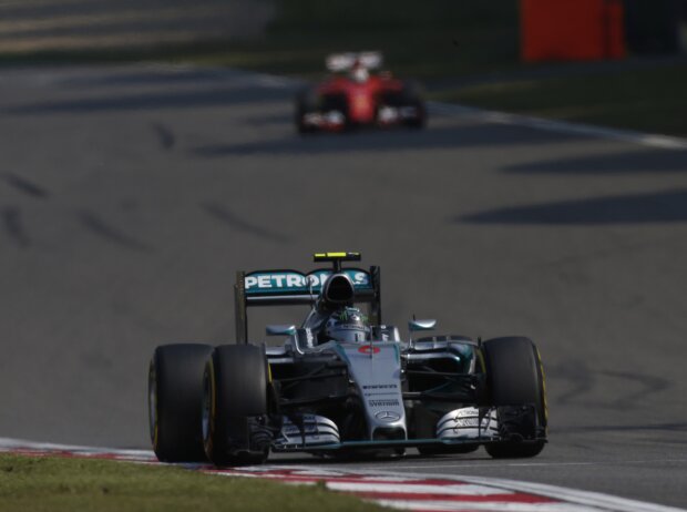 Nico Rosberg, Sebastian Vettel Nico Rosberg, Sebastian Vettel