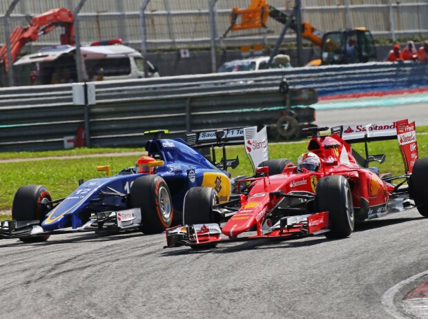Titel-Bild zur News: Felipe Nasr, Sebastian Vettel