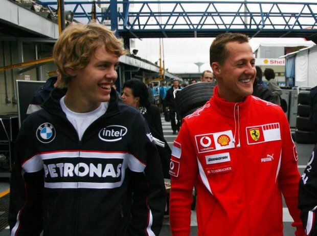 Sebastian Vettel, Michael Schumacher Sebastian Vettel, Michael Schumacher