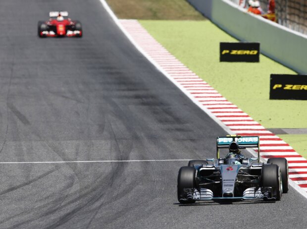 Nico Rosberg, Sebastian Vettel Nico Rosberg, Sebastian Vettel