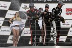 Will Power, Graham Rahal und Juan Pablo Montoya in Sektlaune