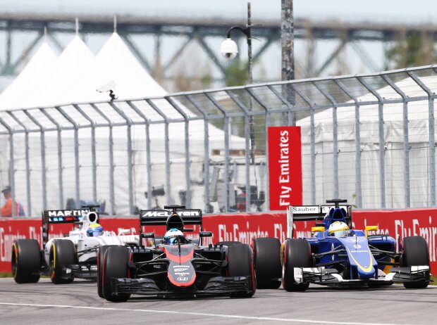 Titel-Bild zur News: Fernando Alonso, Marcus Ericsson