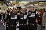 Romain Dumas, Neel Jani und Marc Lieb (Porsche) jubeln über die Pole-Position 