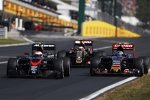 Jenson Button (McLaren), Carlos Sainz (Toro Rosso) und Pastor Maldonado (Lotus) 