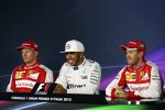 Lewis Hamilton (Mercedes), Sebastian Vettel (Ferrari) und Kimi Räikkönen (Ferrari) 
