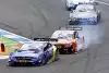 Bild zum Inhalt: Vollgas vor der Zielgeraden - die DTM auf dem Nürburgring