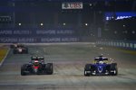 Jenson Button (McLaren) und Marcus Ericsson (Sauber) 