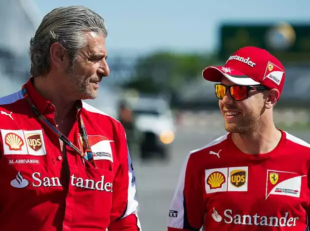 Titel-Bild zur News: Maurizio Arrivabene, Sebastian Vettel