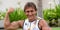 Bild zum Inhalt: Alessandro Zanardi feiert Klassensieg beim Ironman-Triathlon