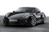 Bild zum Inhalt: Porsche Cayman in schwarzem Gewand