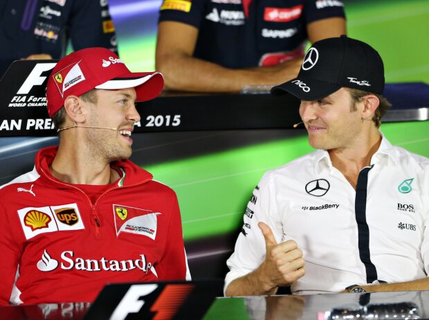 Sebastian Vettel, Nico Rosberg Sebastian Vettel, Nico Rosberg