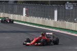 Kimi Räikkönen (Ferrari) und Jenson Button (McLaren) 