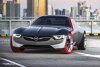 Bild zum Inhalt: Genf 2015: Das Opel GT Concept rast auf roten Reifen Richtung Zukunft