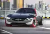 Bild zum Inhalt: Genf 2015: Das Opel GT Concept rast auf roten Reifen Richtung Zukunft