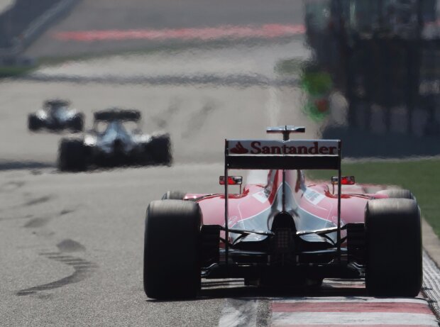 Sebastian Vettel, Lewis Hamilton, Nico Rosberg Sebastian Vettel, Lewis Hamilton, Nico Rosberg