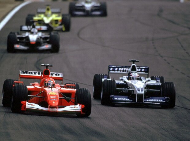 Michael Schumacher, Juan Pablo Montoya Michael Schumacher, Juan Pablo Montoya