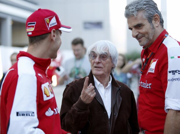 Titel-Bild zur News: Bernie Ecclestone, Maurizio Arrivabene, Sebastian Vettel