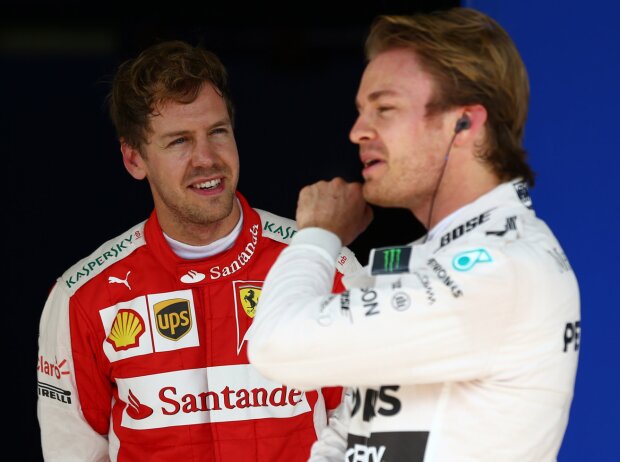 Sebastian Vettel, Nico Rosberg Sebastian Vettel, Nico Rosberg