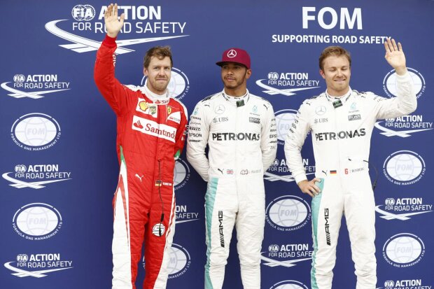 Lewis Hamilton Sebastian Vettel Nico Rosberg Ferrari Scuderia Ferrari F1Mercedes Mercedes AMG Petronas Formula One Team F1 ~Lewis Hamilton (Mercedes), Sebastian Vettel (Ferrari) und Nico Rosberg (Mercedes) ~ 